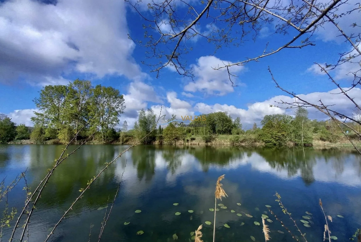 Terrain de 2,2 hectares avec étangs à Bucy-le-Long, idéal pour la détente et la pêche 