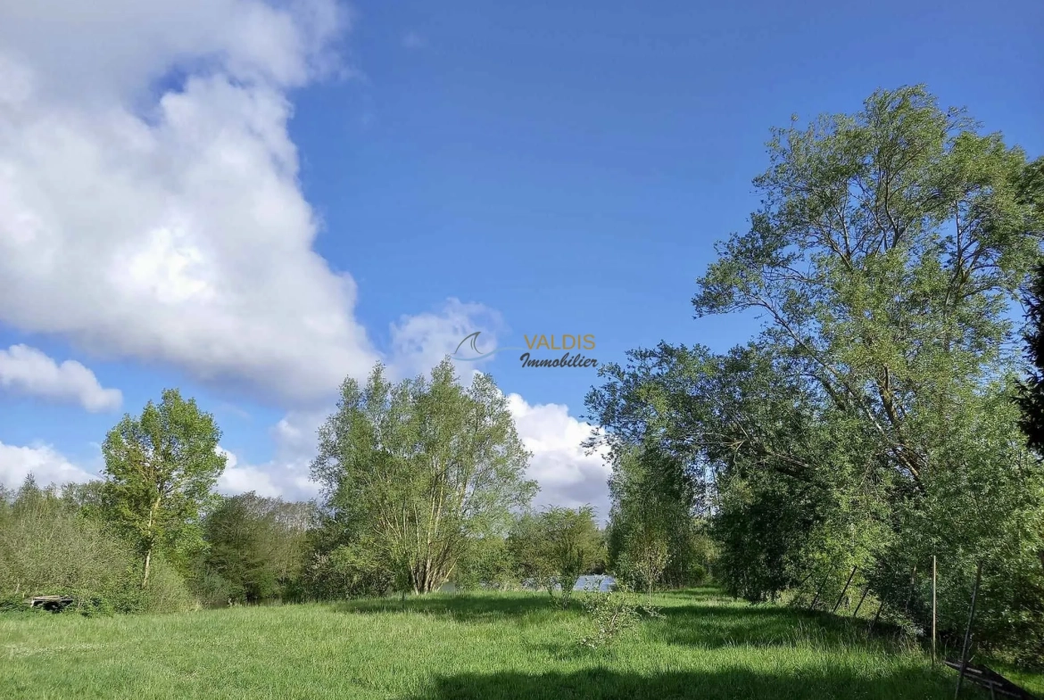 Terrain de 2,2 hectares avec étangs à Bucy-le-Long, idéal pour la détente et la pêche 