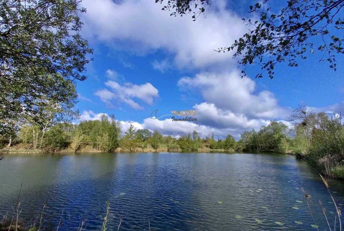 Terrain de 2,2 hectares avec étangs à Bucy-le-Long, idéal pour la détente et la pêche 