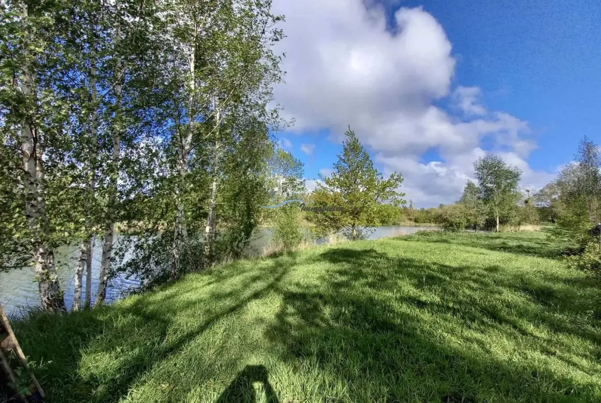 Terrain de 2,2 hectares avec étangs à Bucy-le-Long, idéal pour la détente et la pêche 