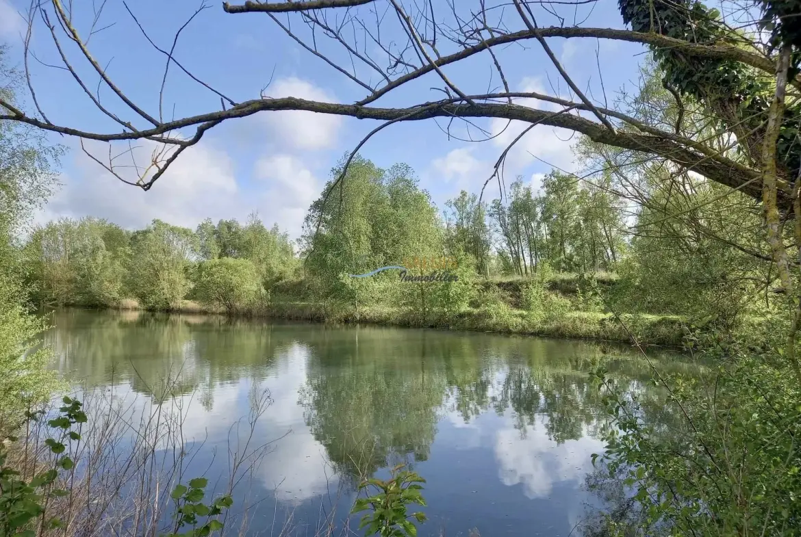 Terrain de 2,2 hectares avec étangs à Bucy-le-Long, idéal pour la détente et la pêche 