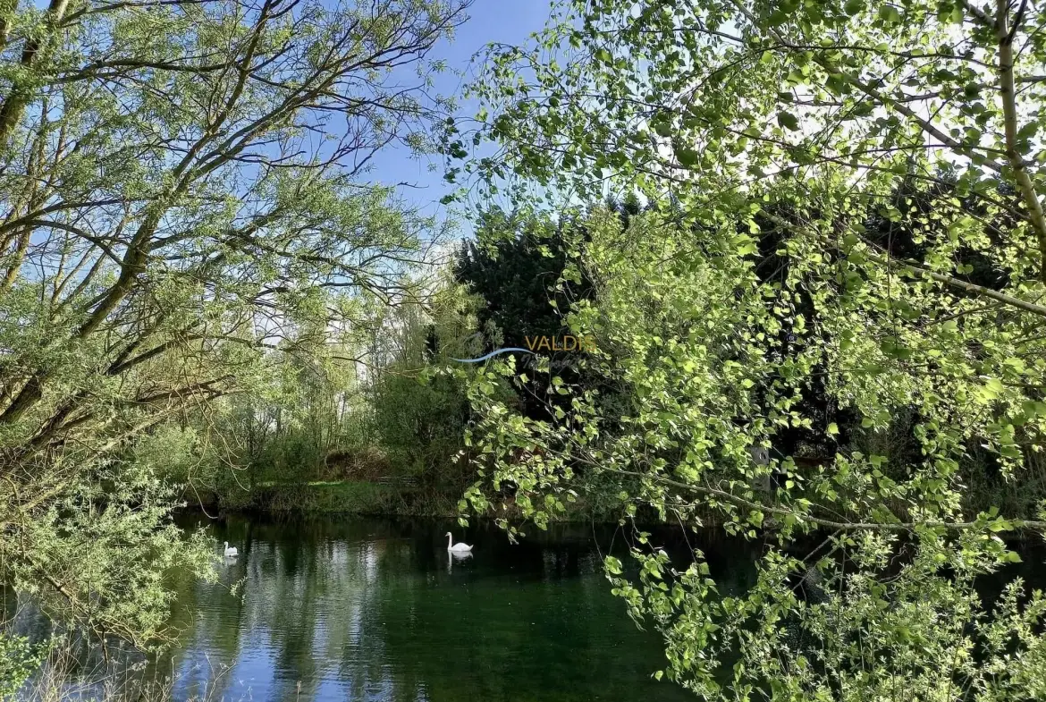 Terrain de 2,2 hectares avec étangs à Bucy-le-Long, idéal pour la détente et la pêche 