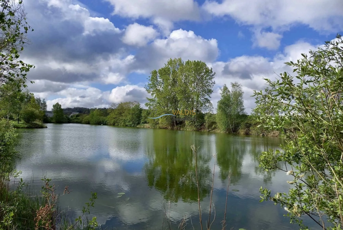 Terrain de 2,2 hectares avec étangs à Bucy-le-Long, idéal pour la détente et la pêche 