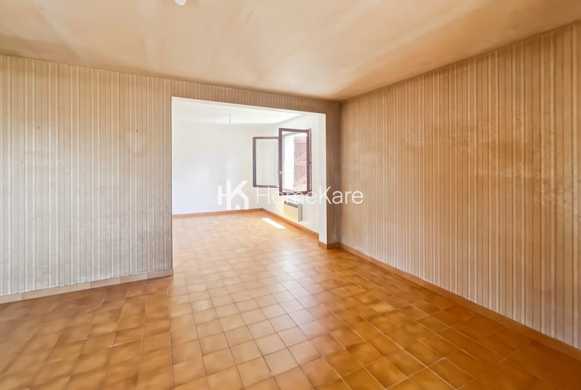 Charmante maison à vendre à Saint-Gaudens avec garage et jardin 