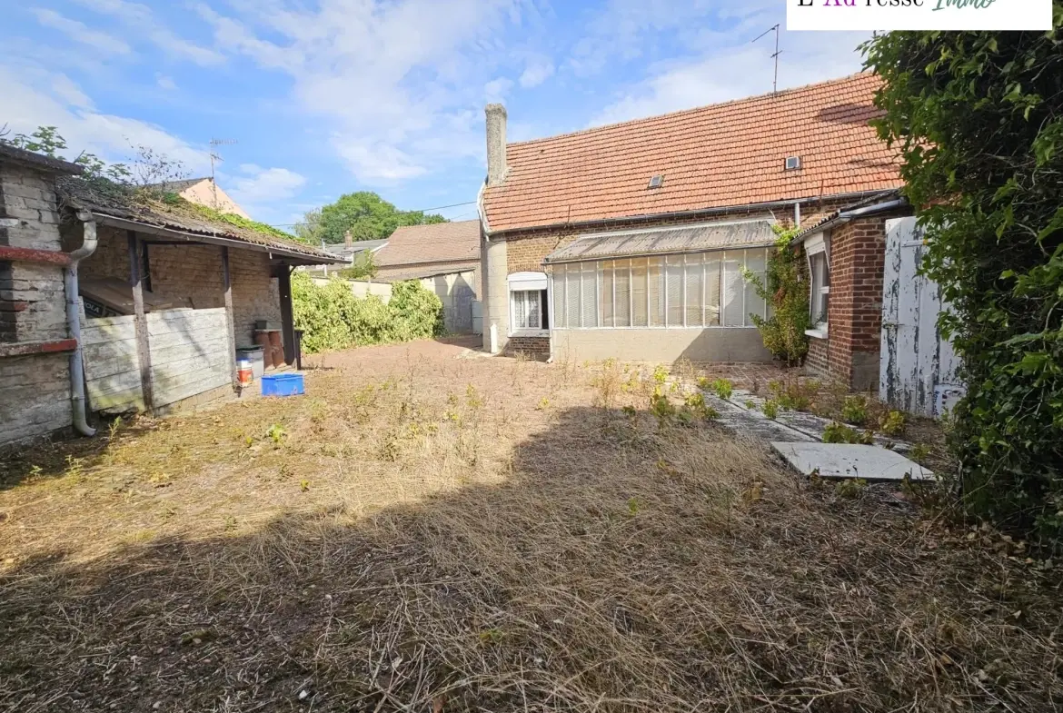 Maison à vendre à Boursies avec grand terrain et potentiel de rénovation 