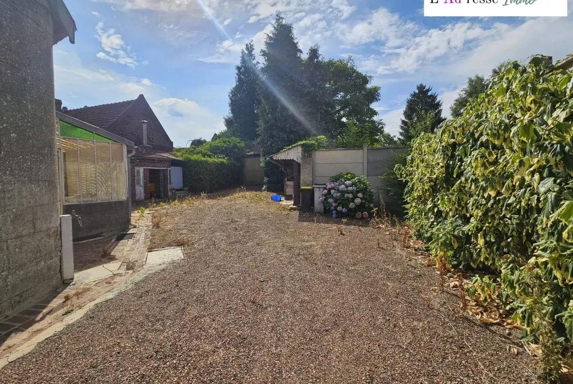 Maison à vendre à Boursies avec grand terrain et potentiel de rénovation 