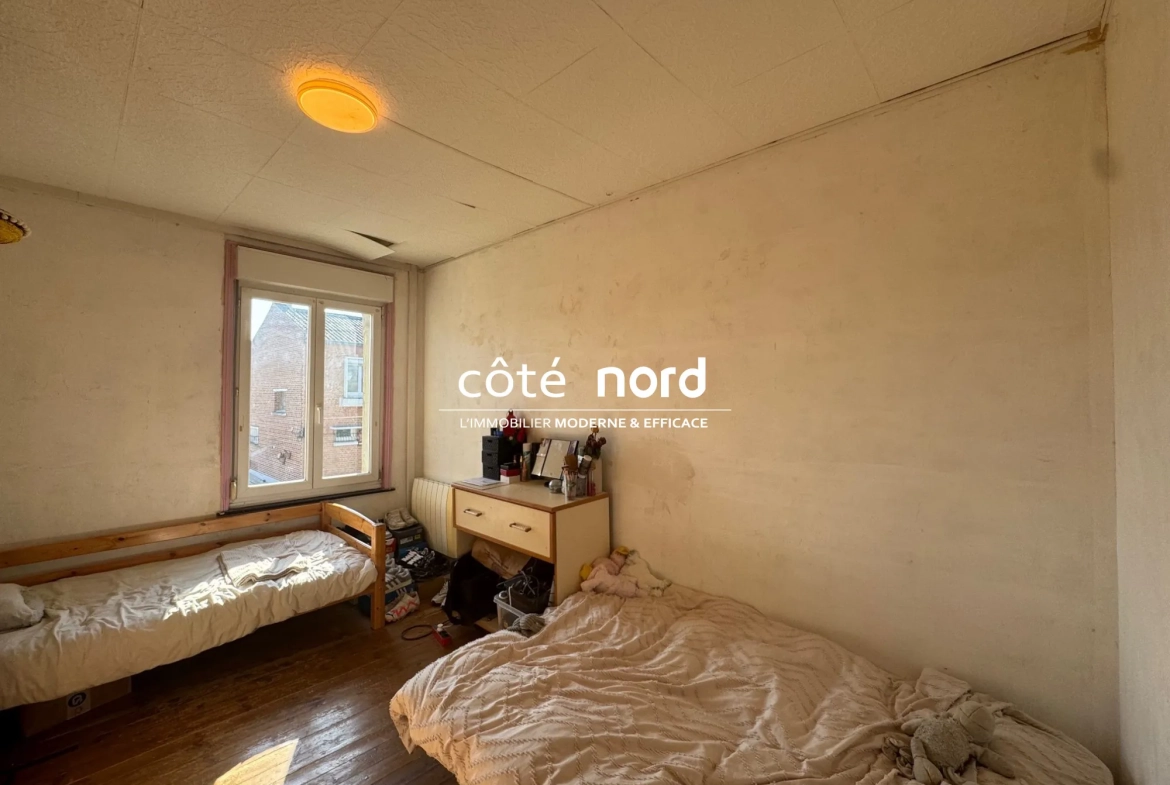 Maison de ville semi-individuelle à Caudry avec jardin et garage - 3 chambres 