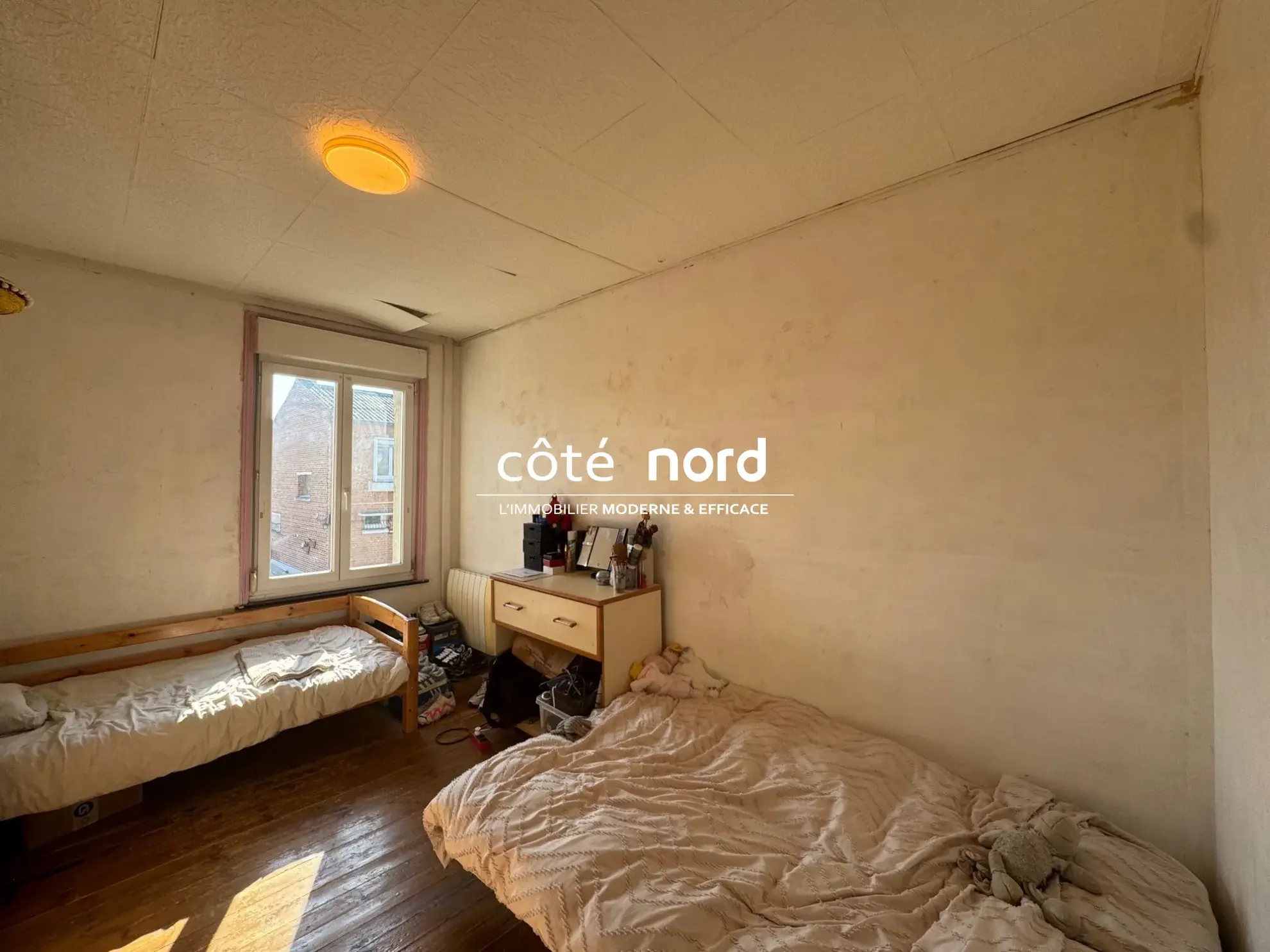 Maison de ville semi-individuelle à Caudry avec jardin et garage - 3 chambres 