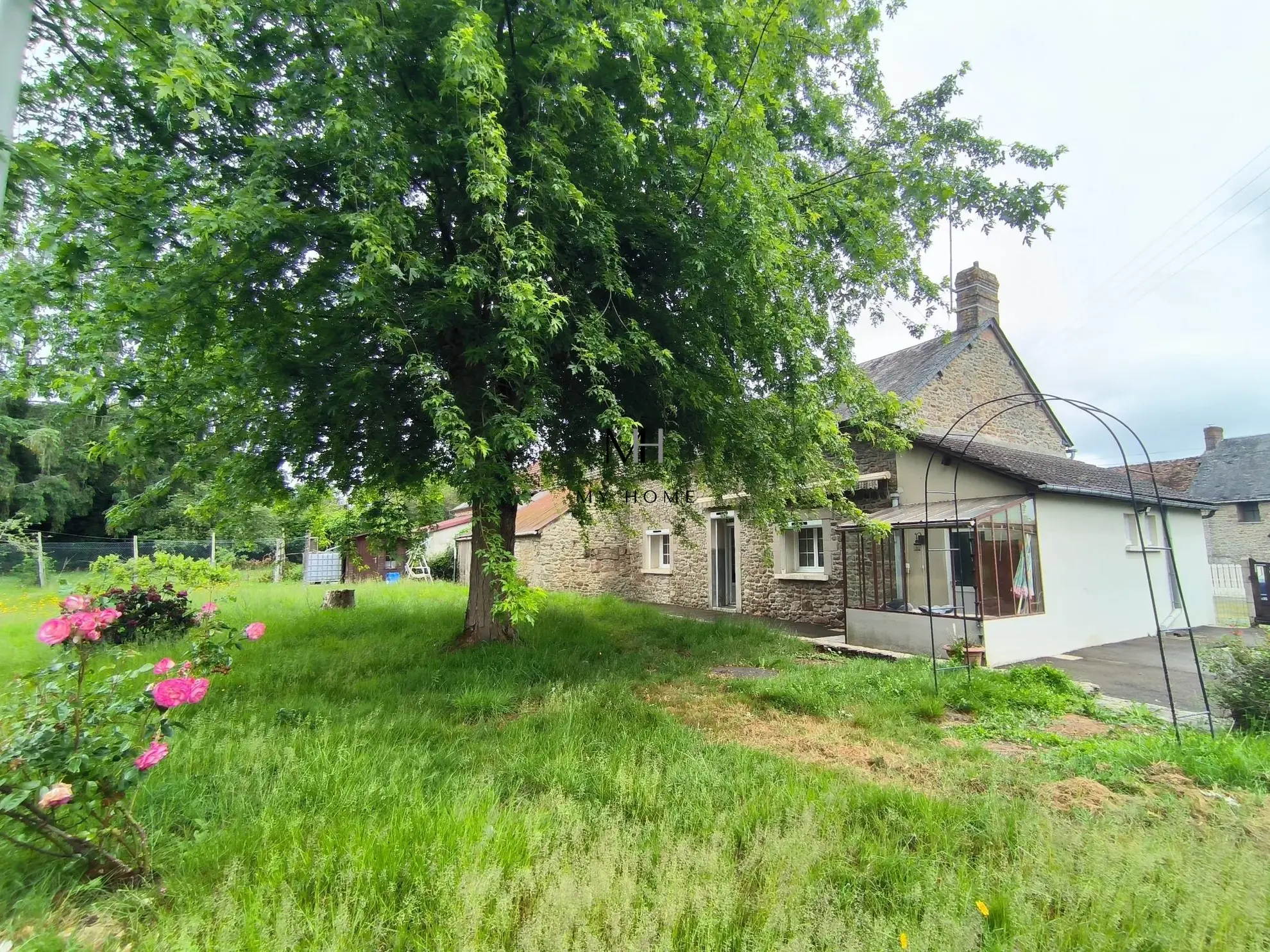 Longère à vendre à Saint-Pierre-des-Nids - 4 chambres, terrain clos et garage 