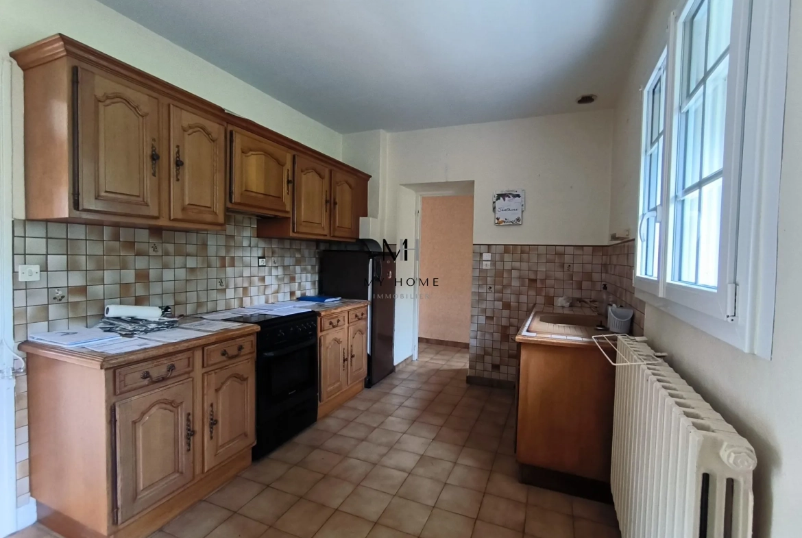 Longère à vendre à Saint-Pierre-des-Nids - 4 chambres, terrain clos et garage 