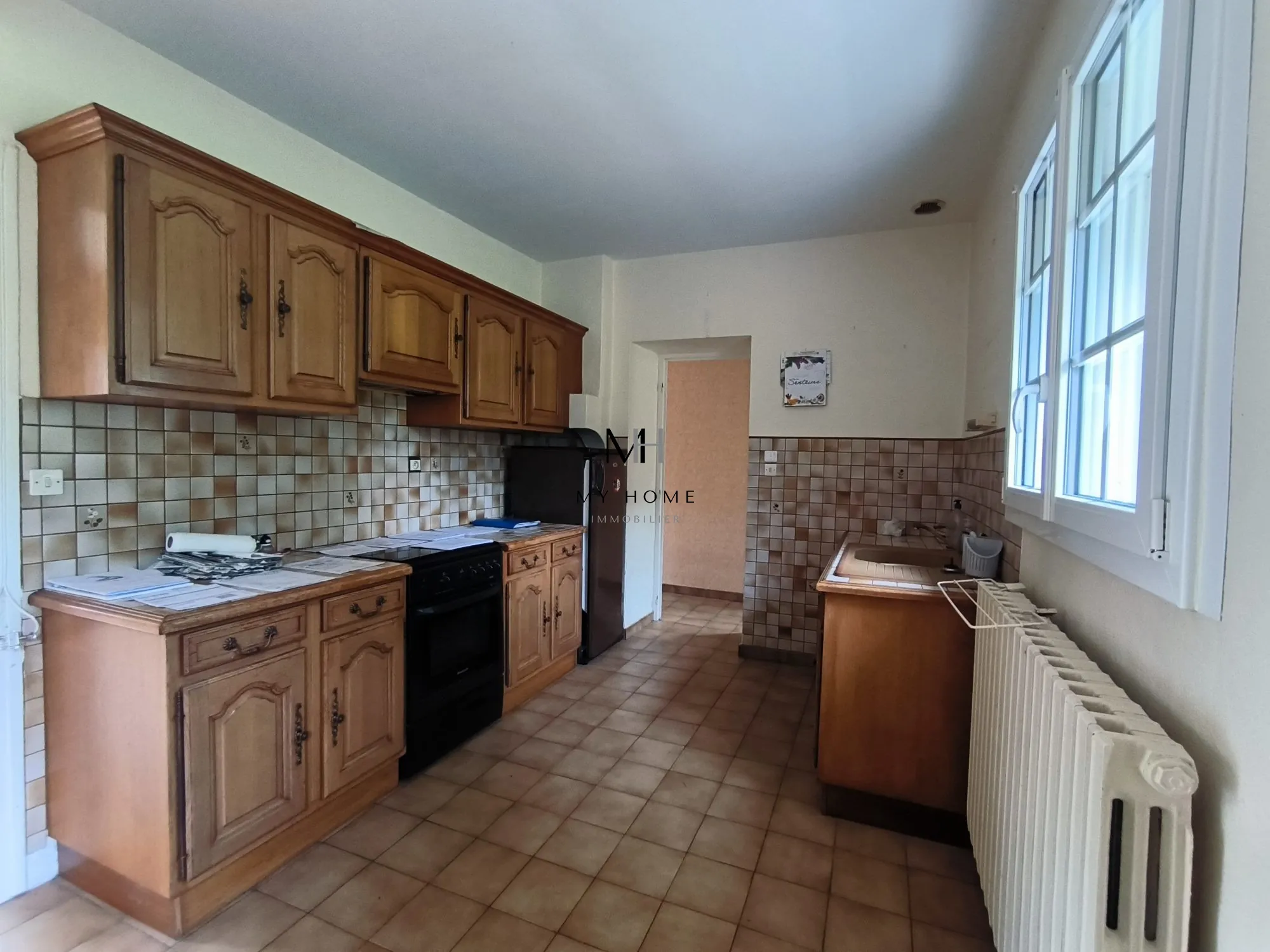 Longère à vendre à Saint-Pierre-des-Nids - 4 chambres, terrain clos et garage 