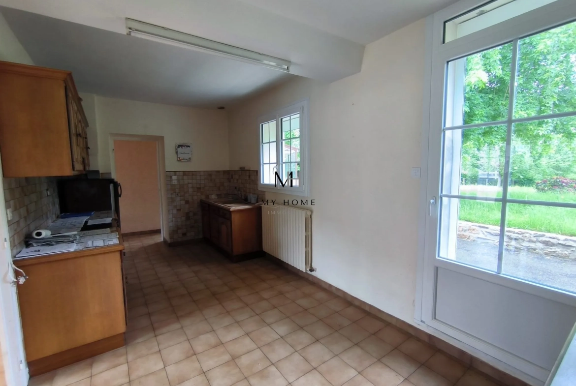 Longère à vendre à Saint-Pierre-des-Nids - 4 chambres, terrain clos et garage 