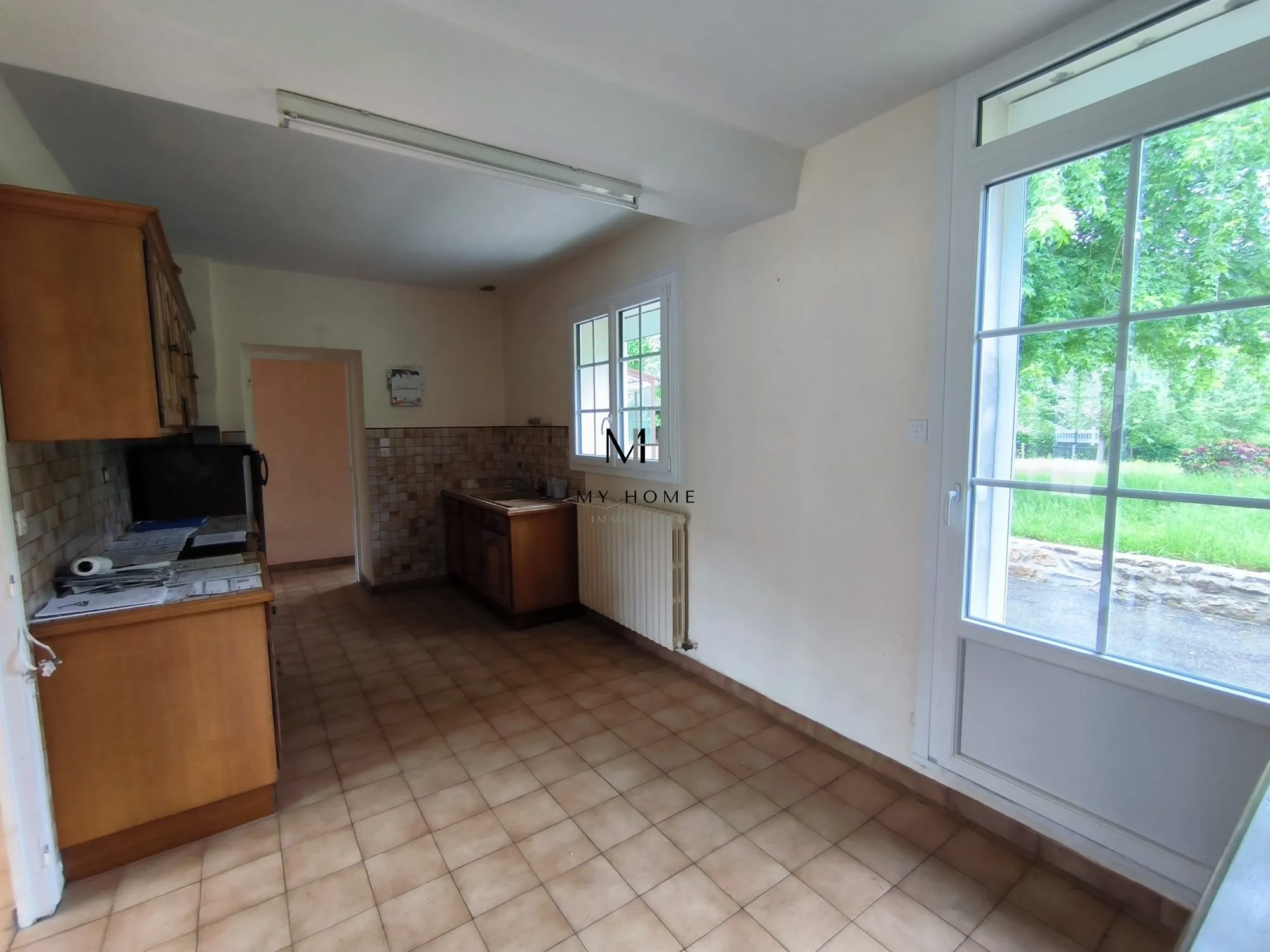 Longère à vendre à Saint-Pierre-des-Nids - 4 chambres, terrain clos et garage 