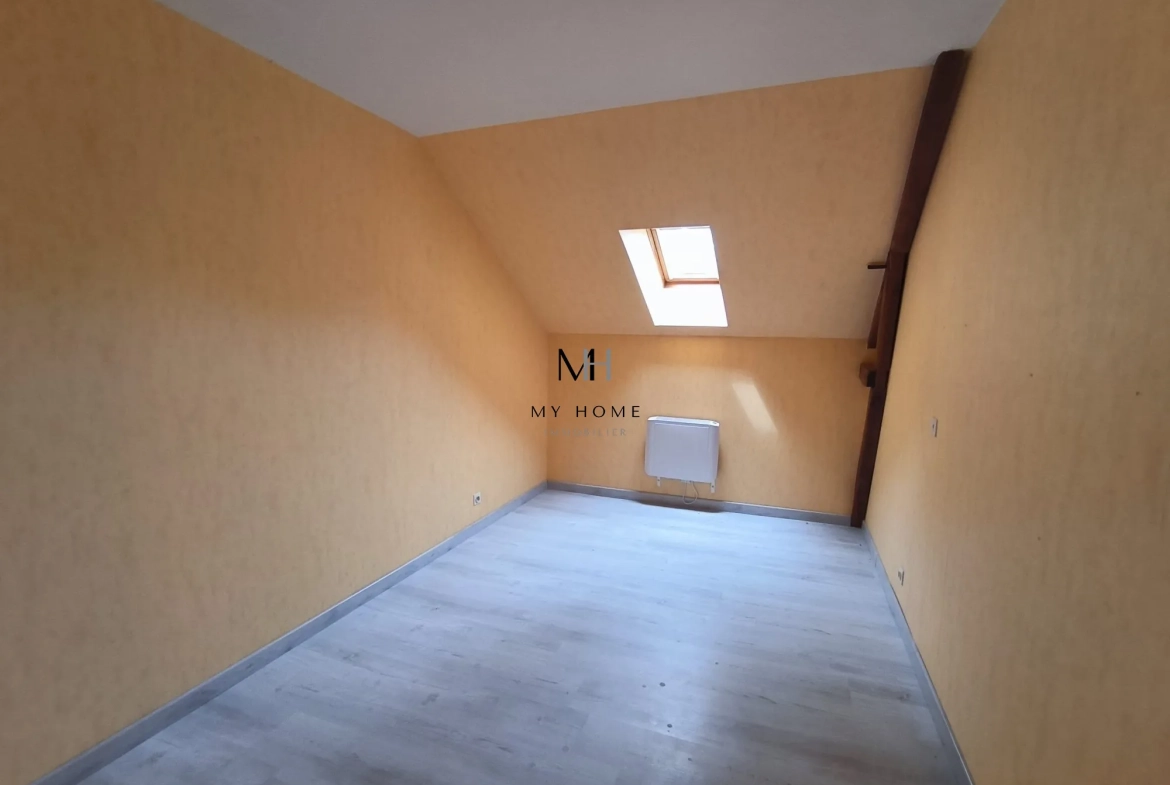 Longère à vendre à Saint-Pierre-des-Nids - 4 chambres, terrain clos et garage 