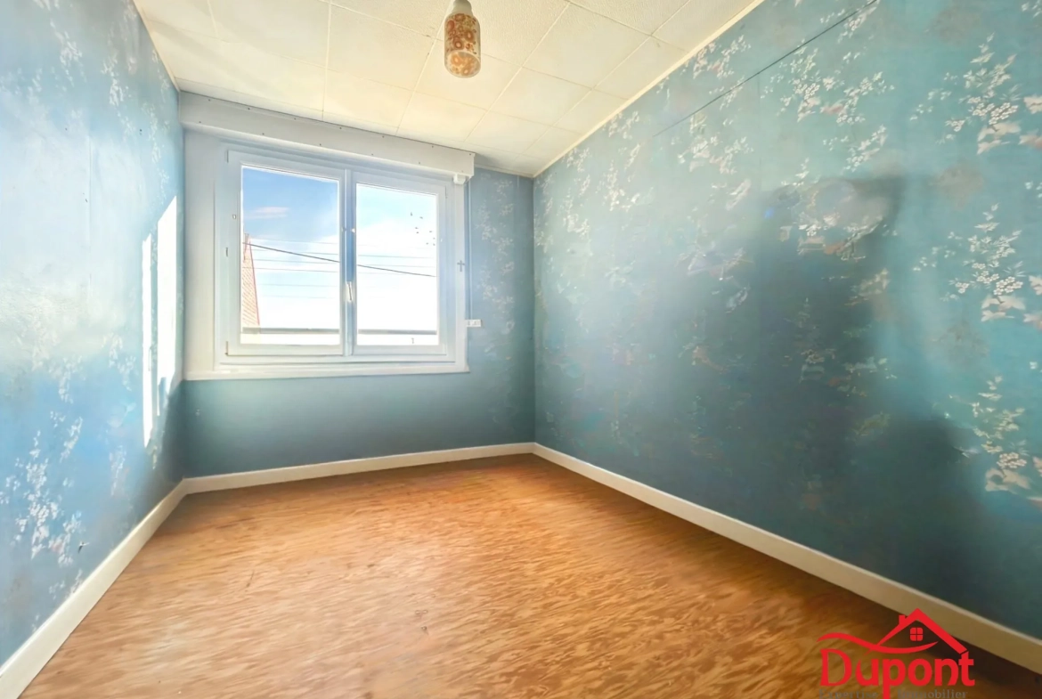 Maison mitoyenne de 90 m² avec jardin et garage à Neuville-Saint-Rémy 