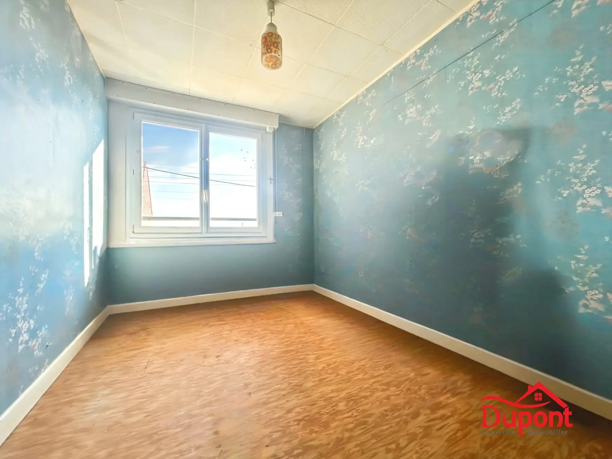 Maison mitoyenne de 90 m² avec jardin et garage à Neuville-Saint-Rémy 