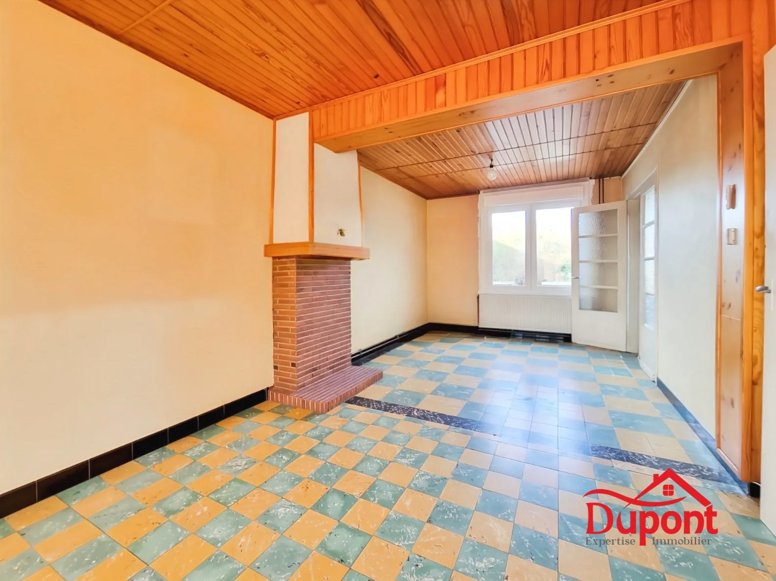 Maison mitoyenne de 90 m² avec jardin et garage à Neuville-Saint-Rémy 