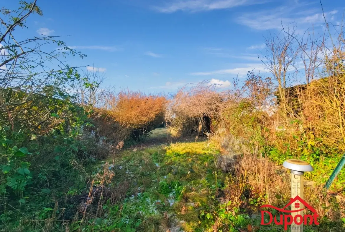 Maison mitoyenne de 90 m² avec jardin et garage à Neuville-Saint-Rémy 