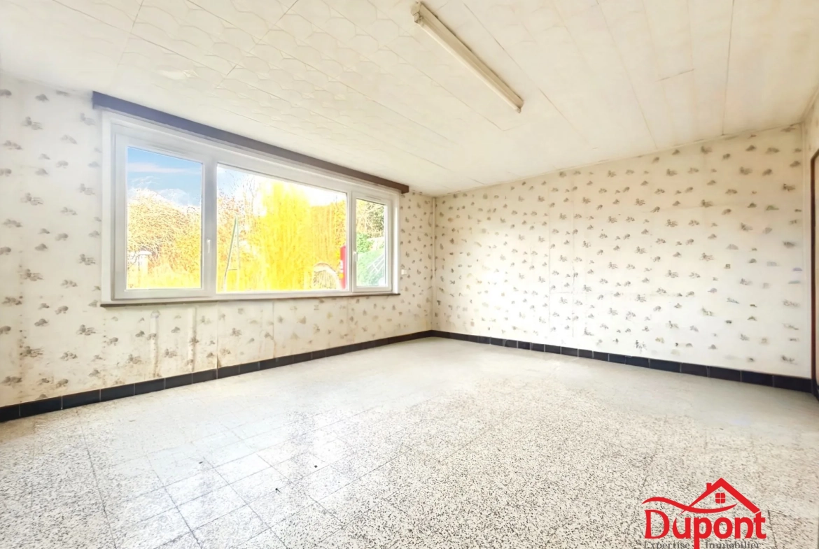Maison mitoyenne de 90 m² avec jardin et garage à Neuville-Saint-Rémy 