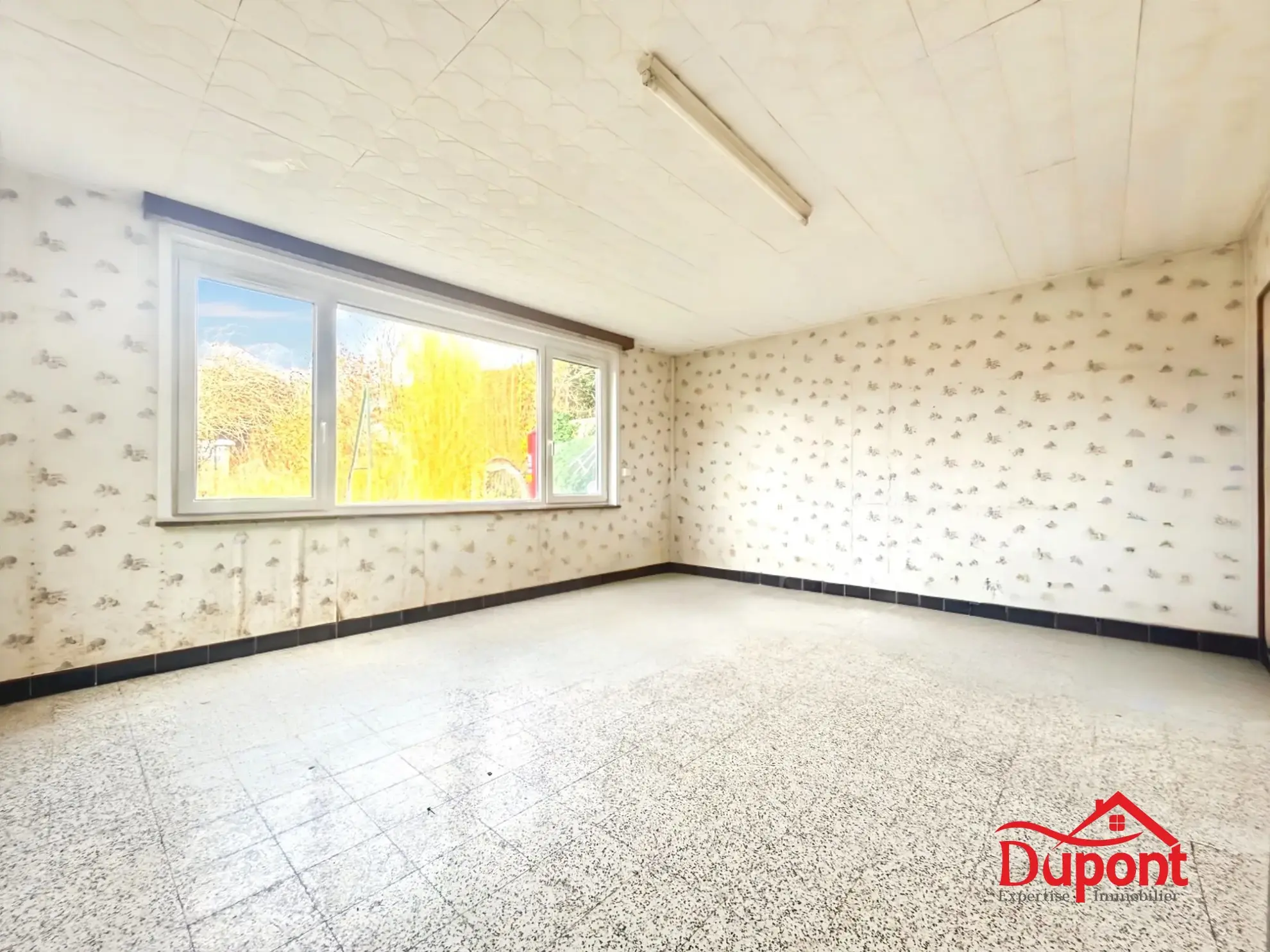 Maison mitoyenne de 90 m² avec jardin et garage à Neuville-Saint-Rémy 