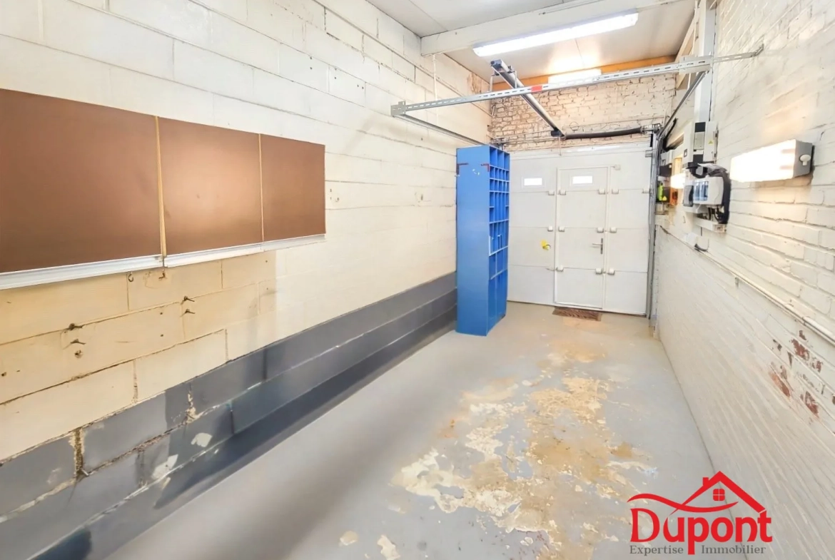 Maison mitoyenne de 90 m² avec jardin et garage à Neuville-Saint-Rémy 