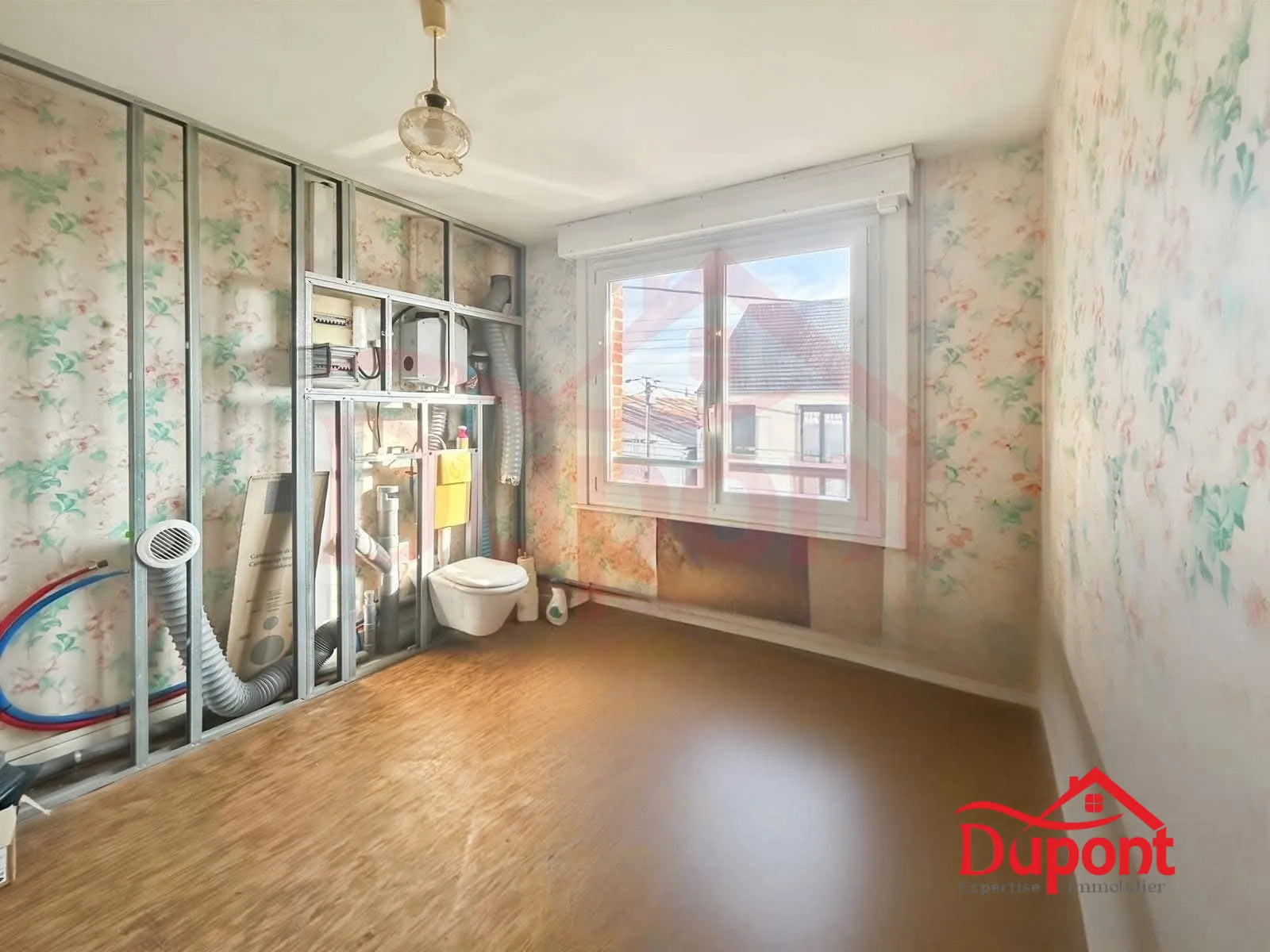 Maison mitoyenne de 90 m² avec jardin et garage à Neuville-Saint-Rémy 