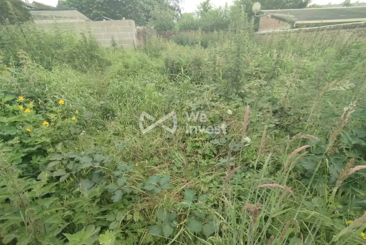 Immeuble de rapport à Fourmies avec potentiel de rénovation et jardin 
