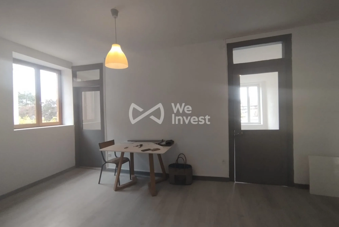 Immeuble de rapport à Fourmies avec potentiel de rénovation et jardin 