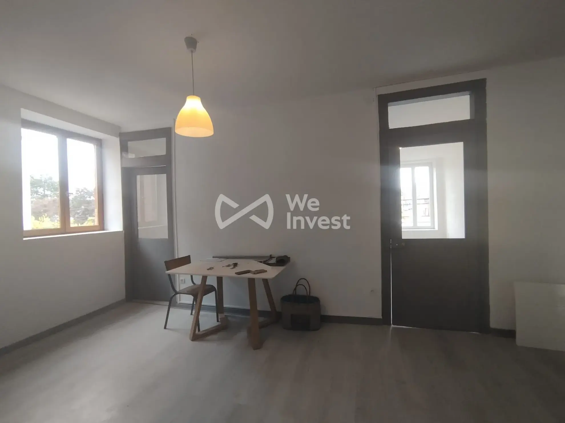 Immeuble de rapport à Fourmies avec potentiel de rénovation et jardin 