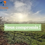 Terrain constructible à Nostang 1200m² avec vue campagne et façade de 30m