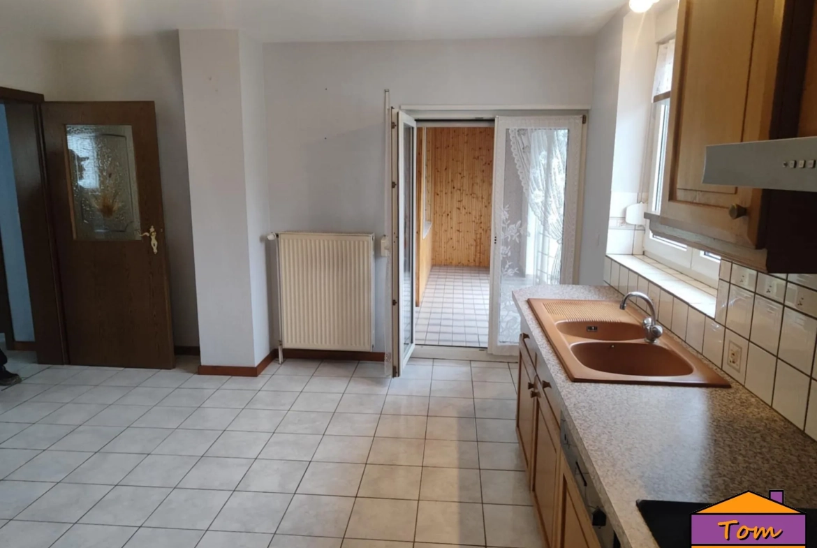 Maison familiale avec appartement loué proche frontière allemande 