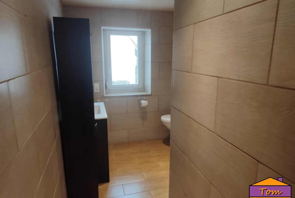 Maison familiale avec appartement loué proche frontière allemande 