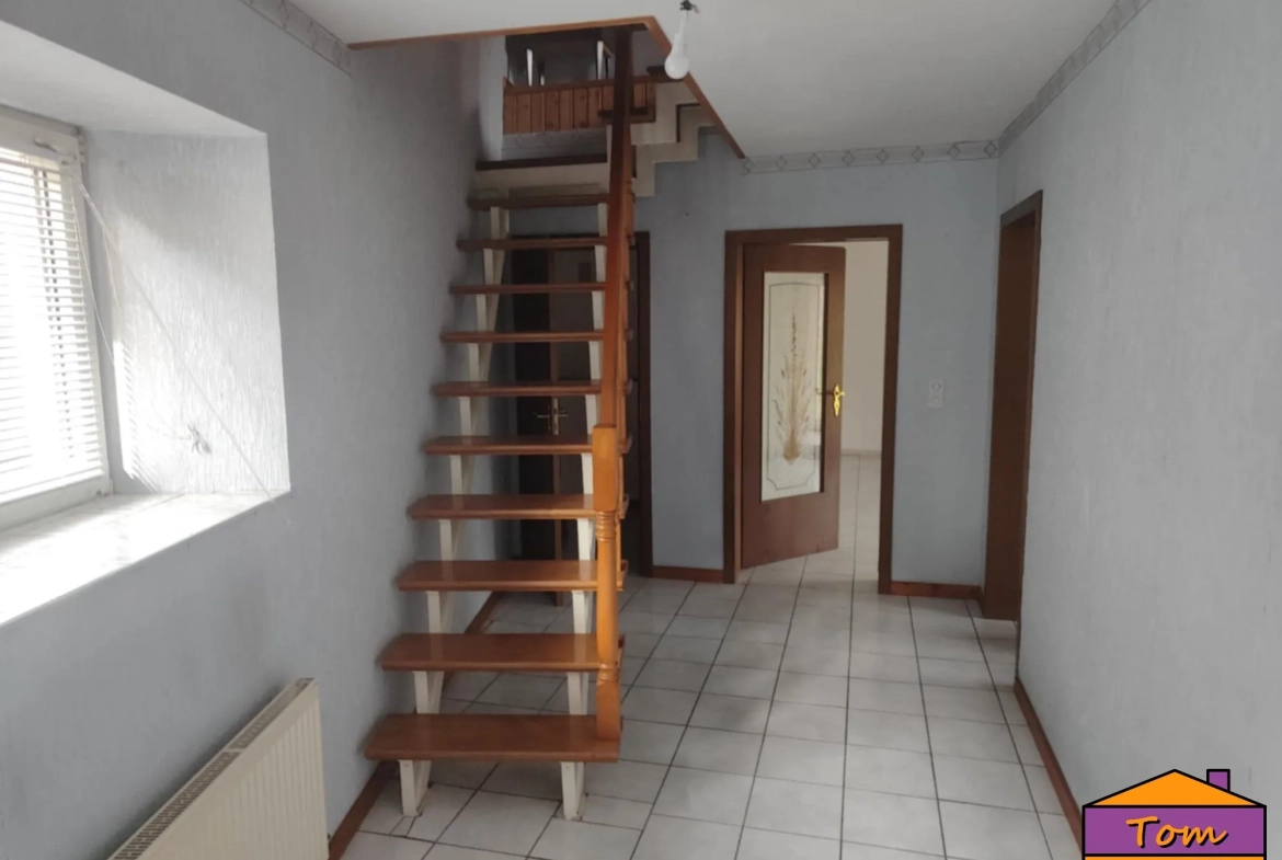 Maison familiale avec appartement loué proche frontière allemande 