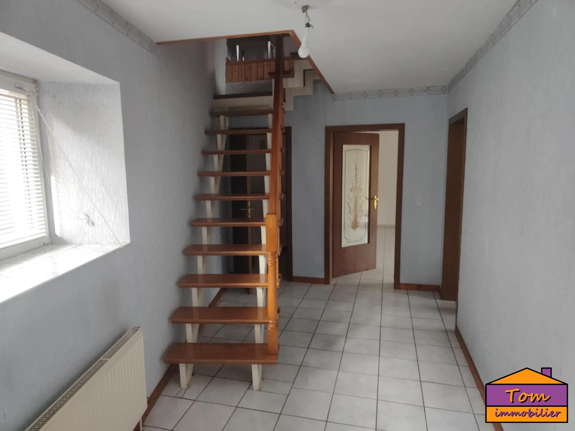 Maison familiale avec appartement loué proche frontière allemande 