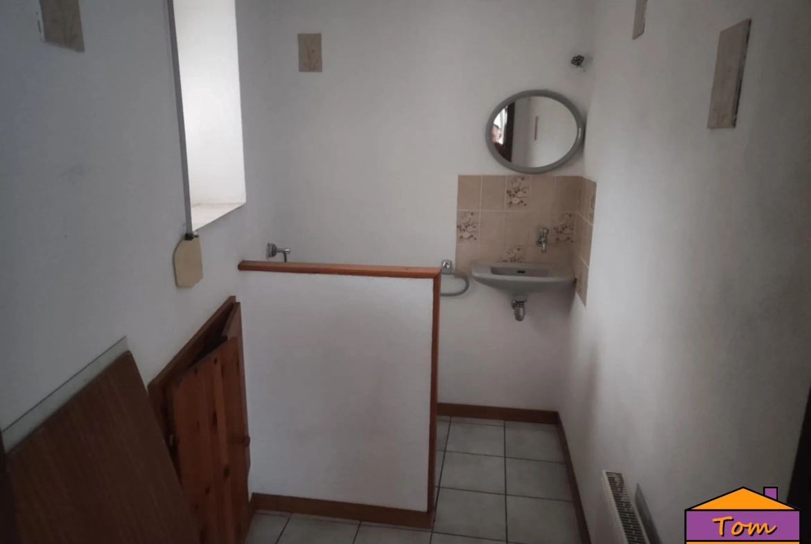 Maison familiale avec appartement loué proche frontière allemande 