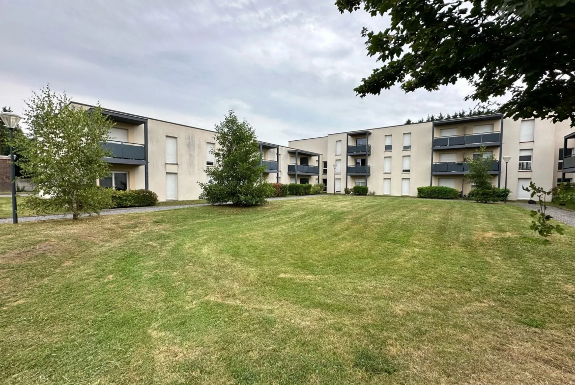 autre perspective espace vert Appartement T2 avec balcon à Douai - Neuf et bien situé 