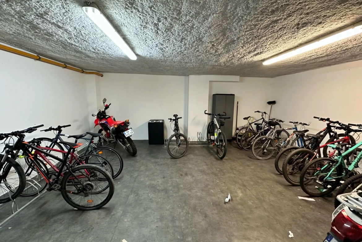 vue du local deux roues Appartement T2 avec balcon à Douai - Neuf et bien situé 
