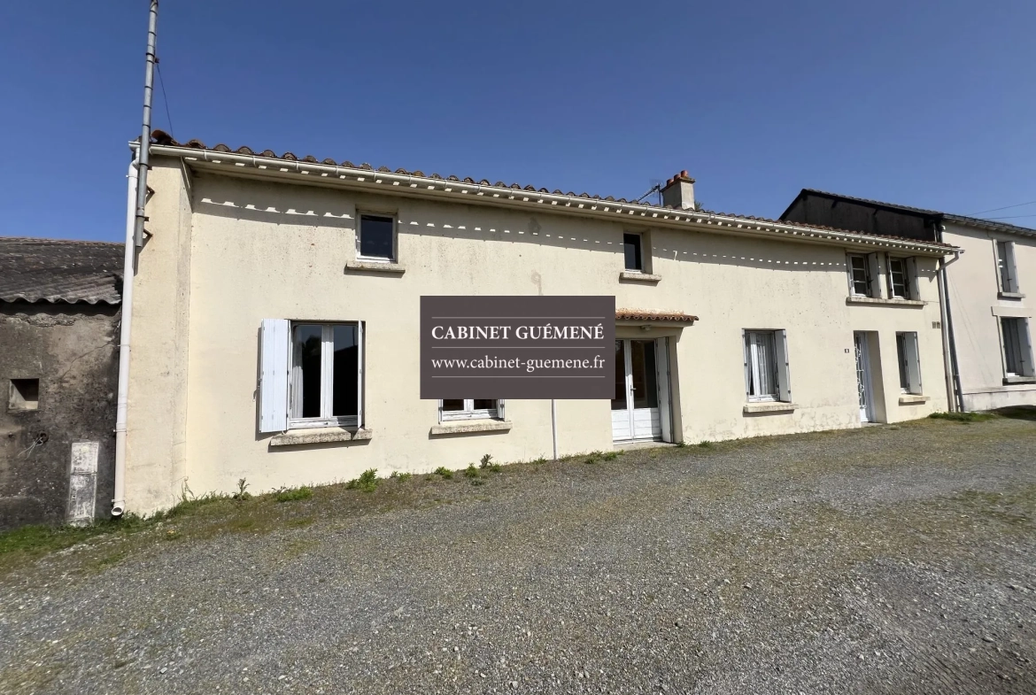 Maison ancienne à Vieillevigne avec dépendances et jardin 