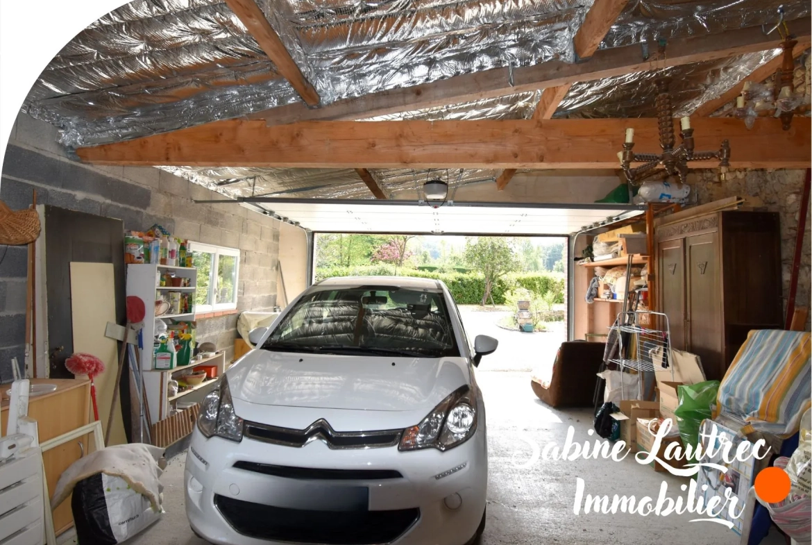 Maison rénovée en pierre à Lombers, proche Realm live, avec jardin et garage — authenticité et confort 