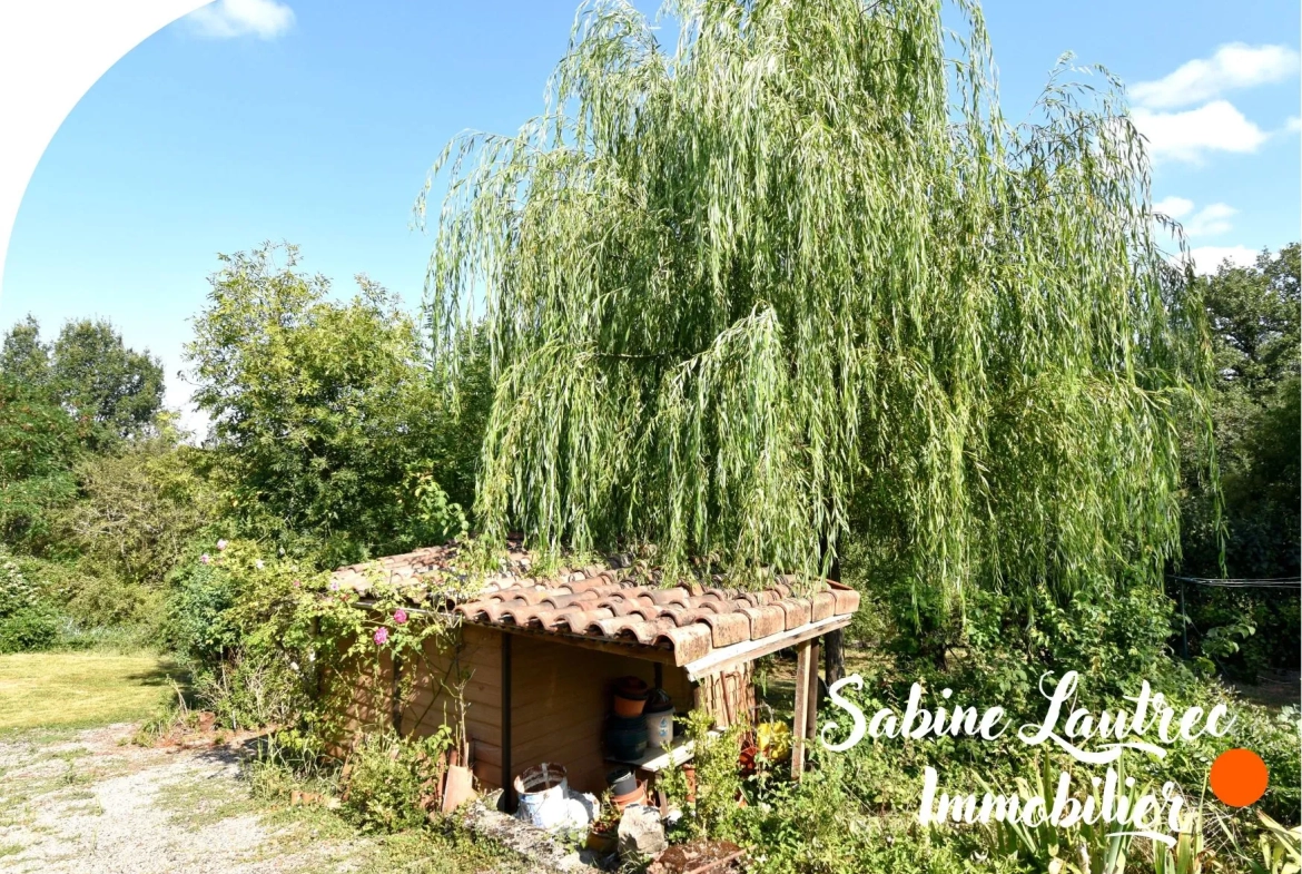 Maison rénovée en pierre à Lombers, proche Realm live, avec jardin et garage — authenticité et confort 