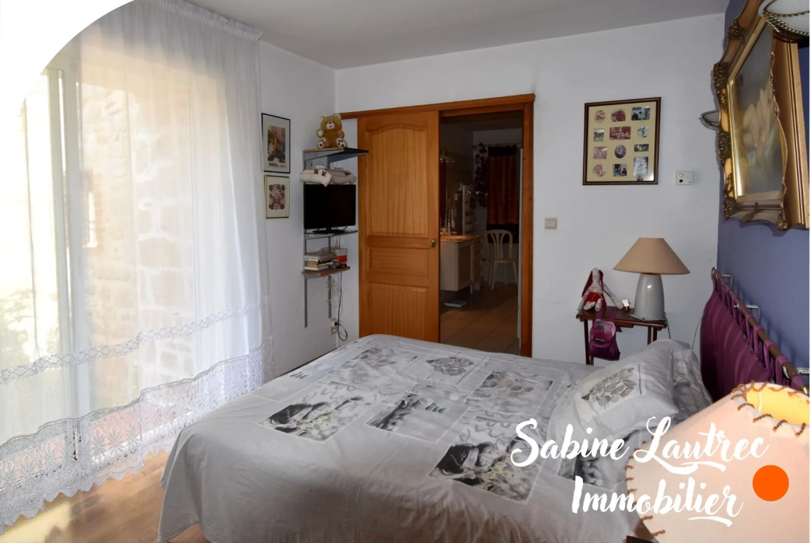 Maison rénovée en pierre à Lombers, proche Realm live, avec jardin et garage — authenticité et confort 