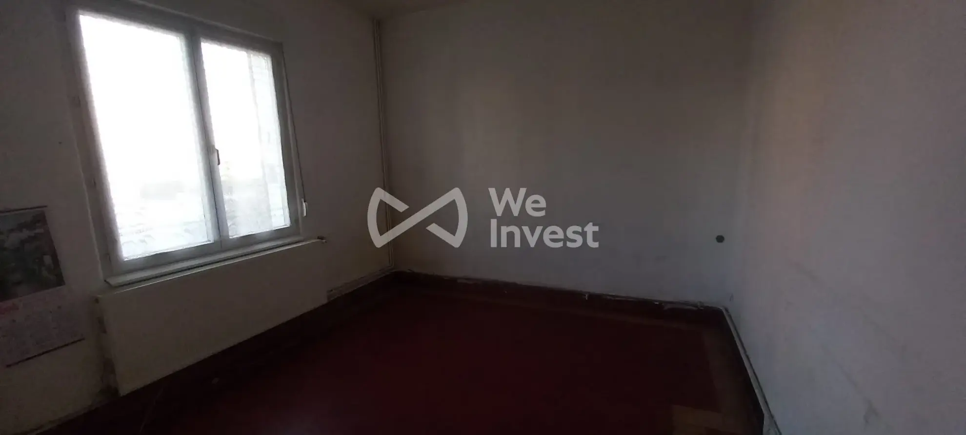 Ensemble immobilier à Sains-du-Nord avec 2 maisons, garage et parking, idéal pour investisseur 