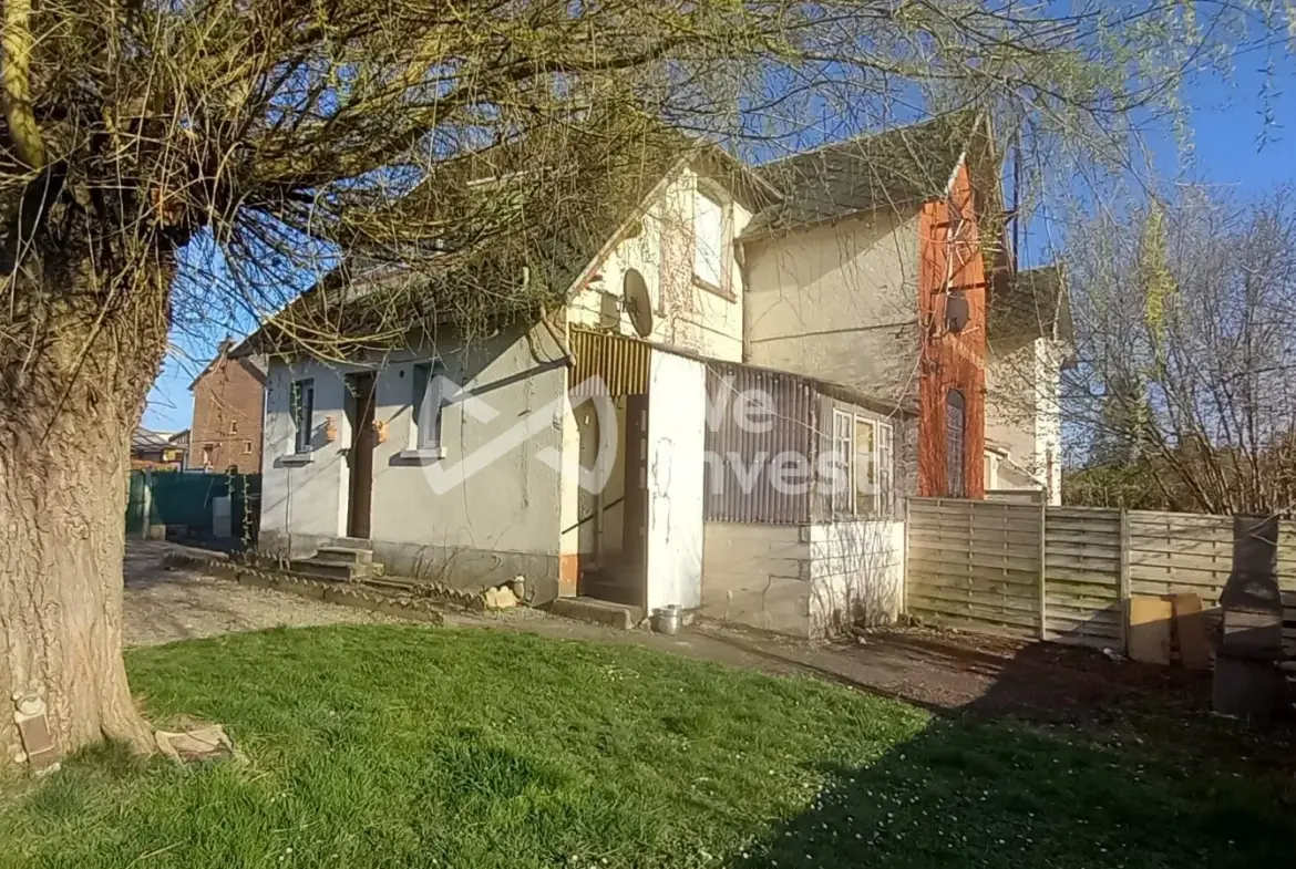 Ensemble immobilier à Sains-du-Nord avec 2 maisons, garage et parking, idéal pour investisseur 