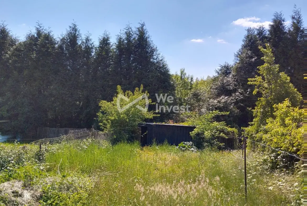 Ensemble immobilier à Sains-du-Nord avec 2 maisons, garage et parking, idéal pour investisseur 