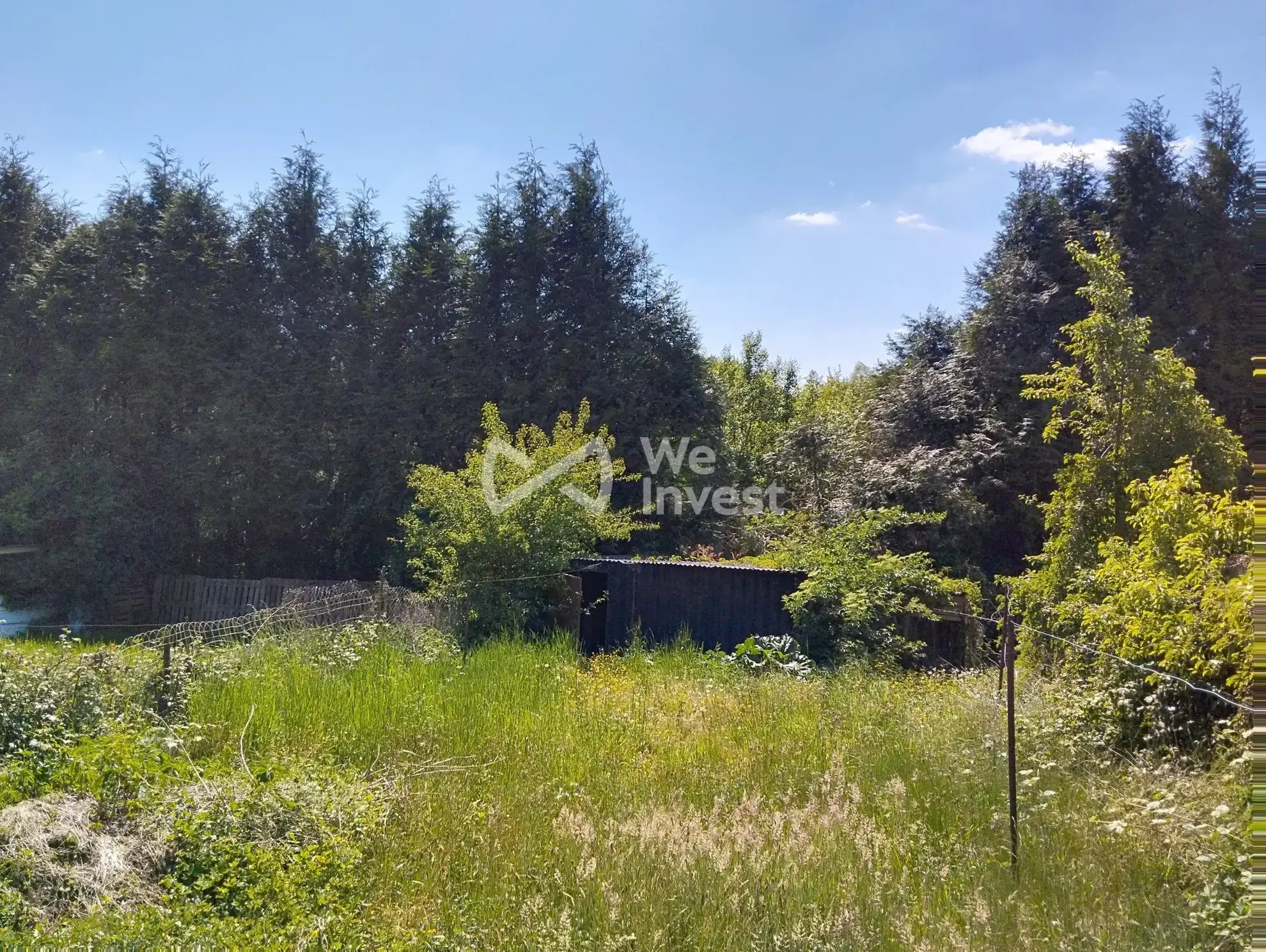 Ensemble immobilier à Sains-du-Nord avec 2 maisons, garage et parking, idéal pour investisseur 