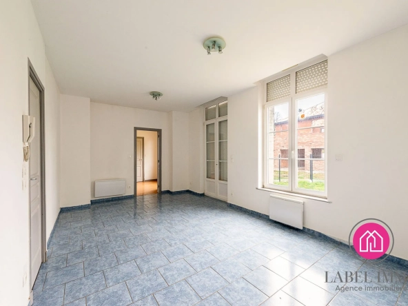 Appartement F3 loué en rez-de-chaussée à Saultain - 72,15 m²