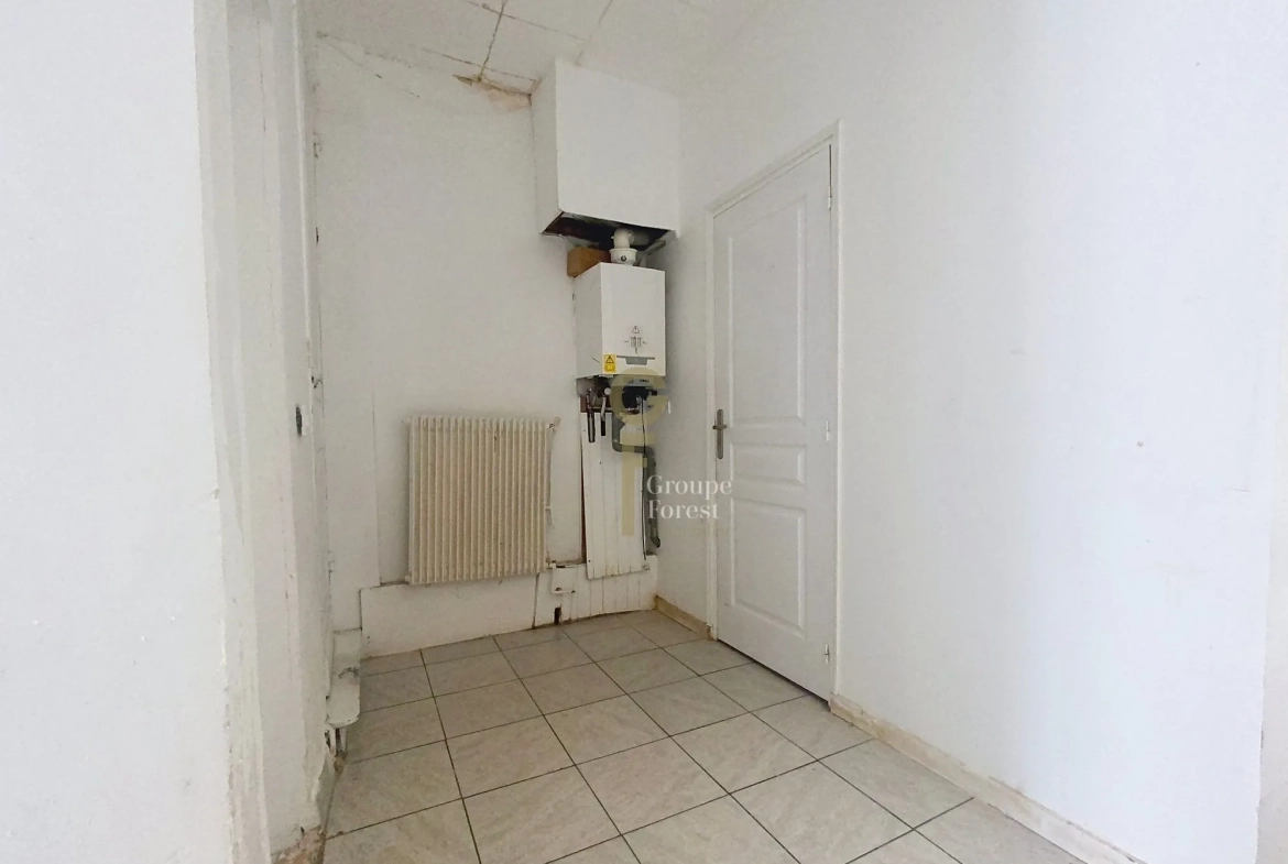 Maison à vendre à Tourcoing - 115 m², idéal rénovation, proximité commodités 