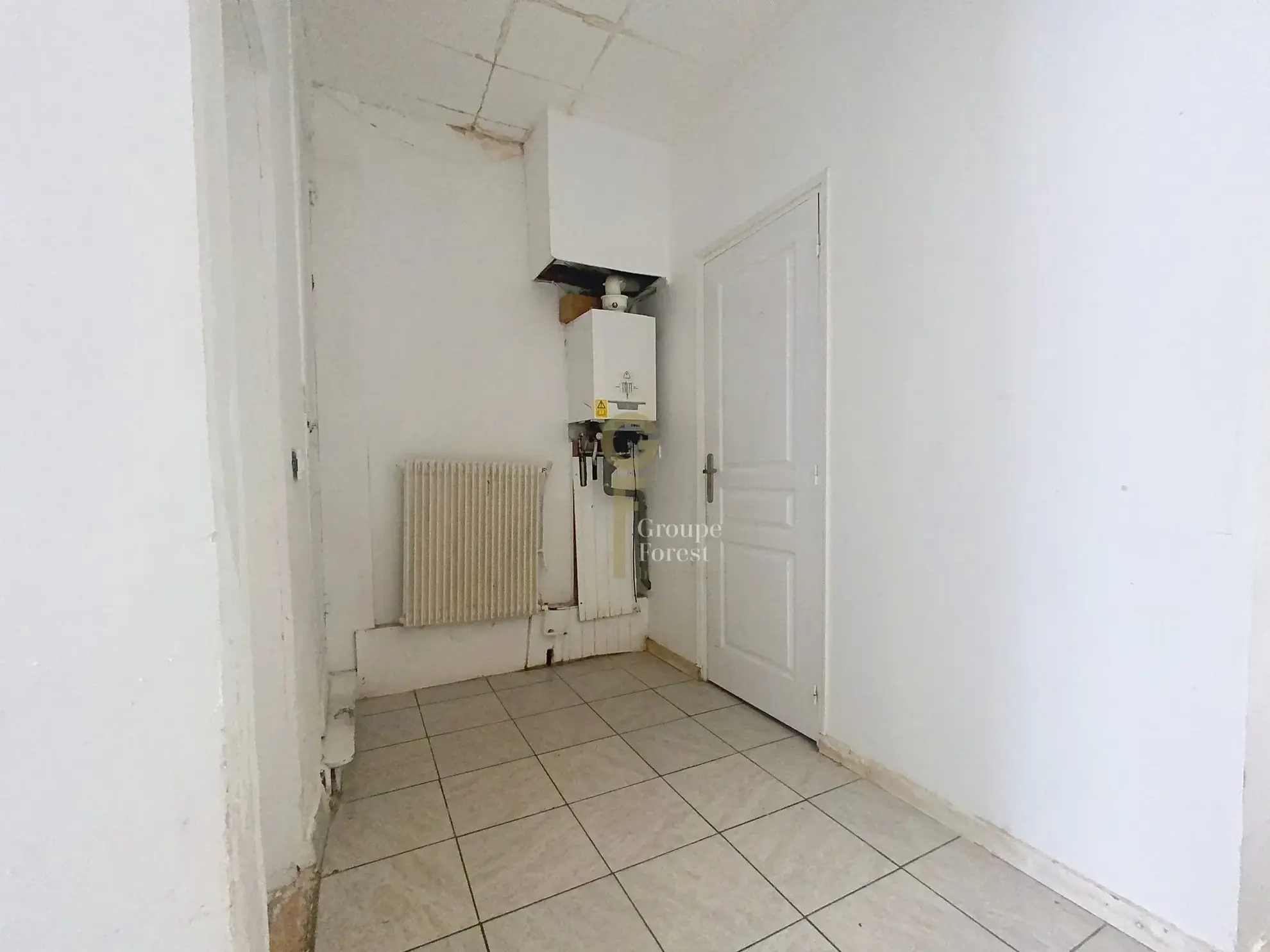 Maison à vendre à Tourcoing - 115 m², idéal rénovation, proximité commodités 