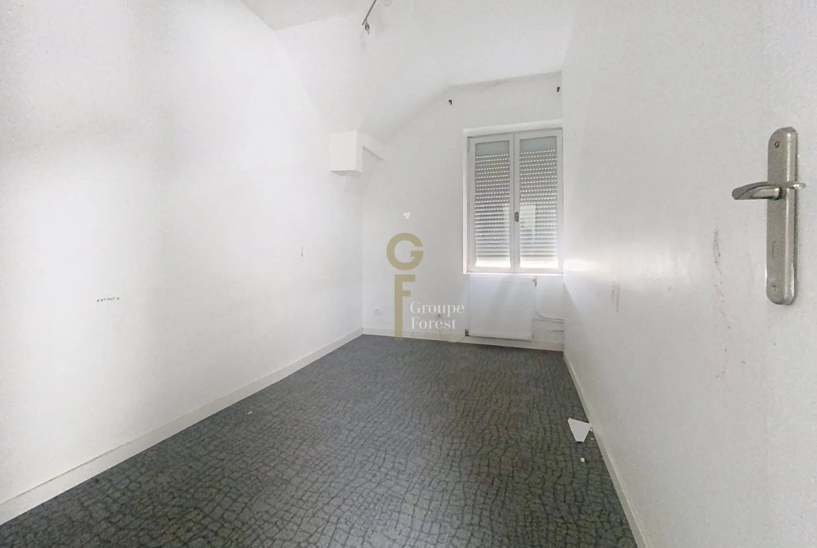 Maison à vendre à Tourcoing - 115 m², idéal rénovation, proximité commodités 