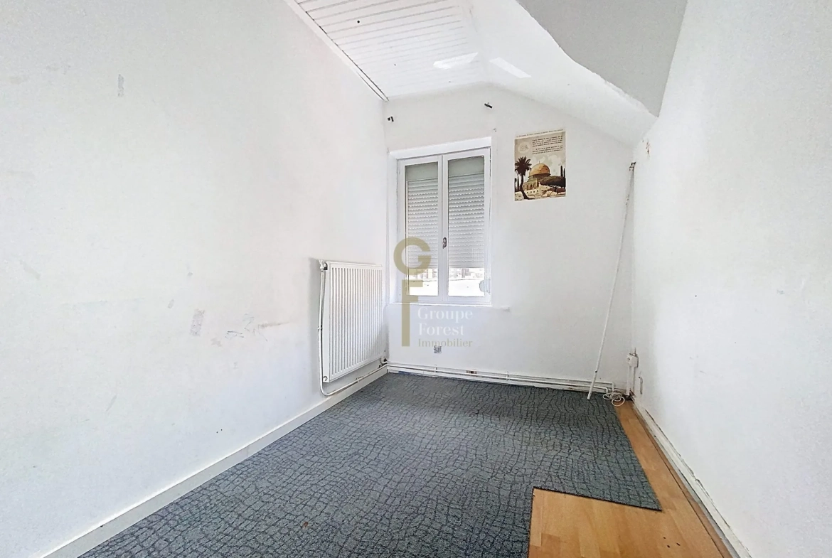 Maison à vendre à Tourcoing - 115 m², idéal rénovation, proximité commodités 